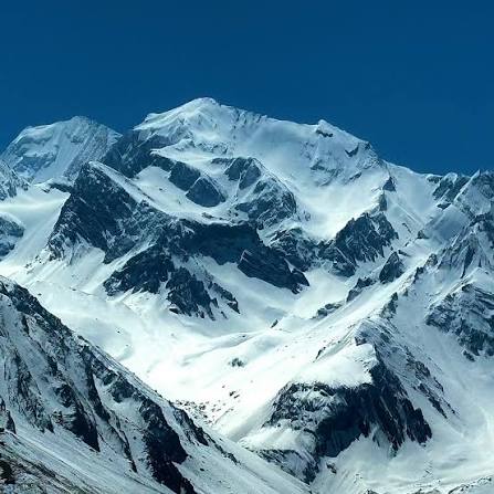 Om Parvat — sacred peak with natural Om snow formation
