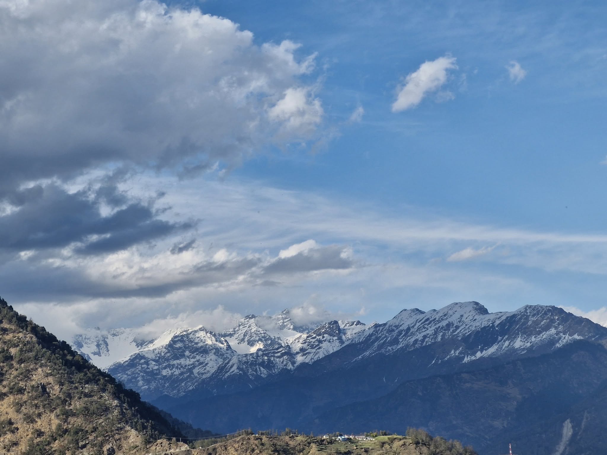 The valley and snow-peak view waking up from a Liti360 stay